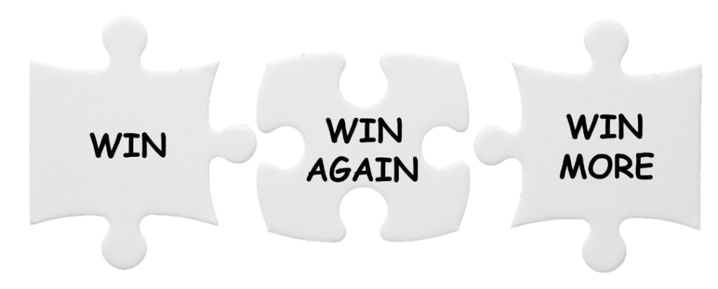 Image: Puzzle pieces - win, win again, win more